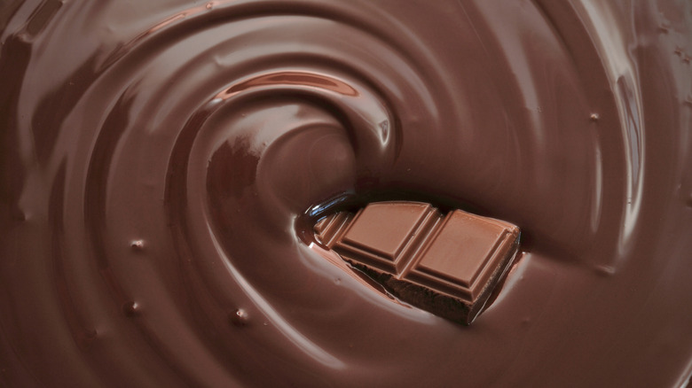 swirl of liquid chocolate with hard chocolate in center