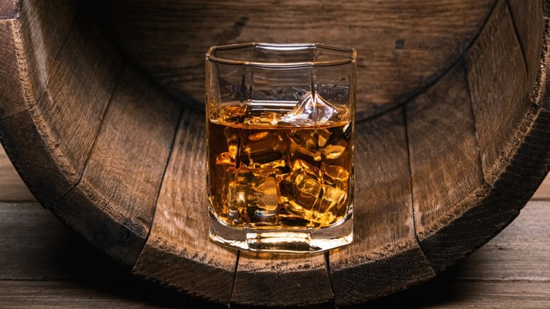 Whiskey on the rocks in a cask