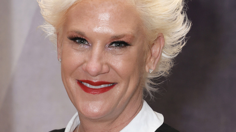 Anne Burrell wearing red lipstick