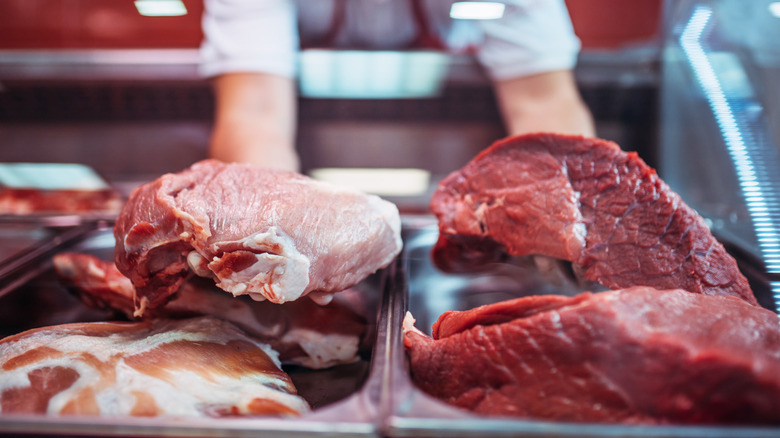 holding raw meat