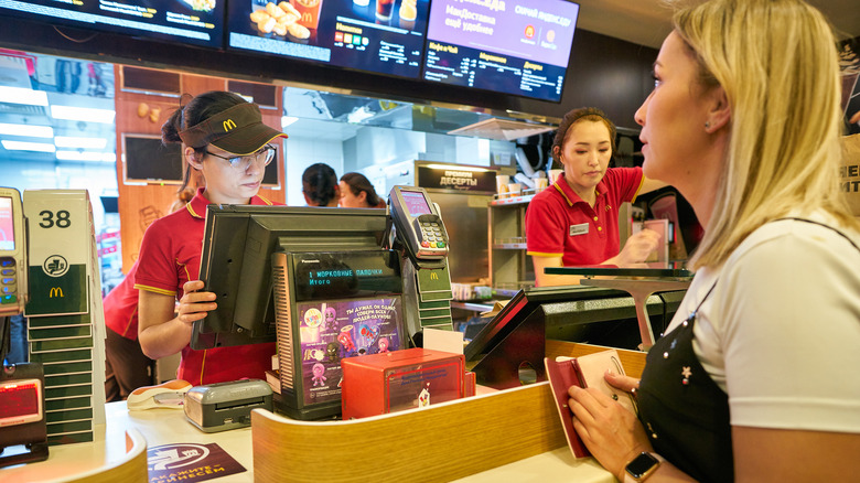 McDonald's employee taking order