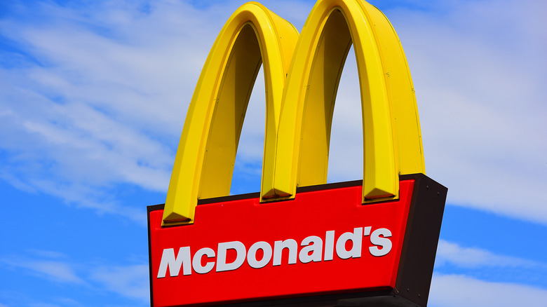McDonald's sign against blue sky 