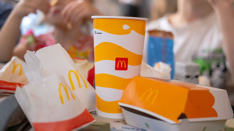 Assorted McDonald's items on table at restaurant.