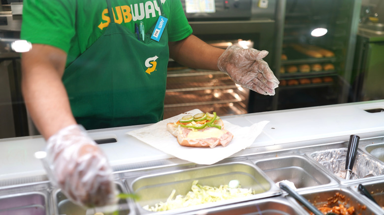 Subway sandwich artist at work