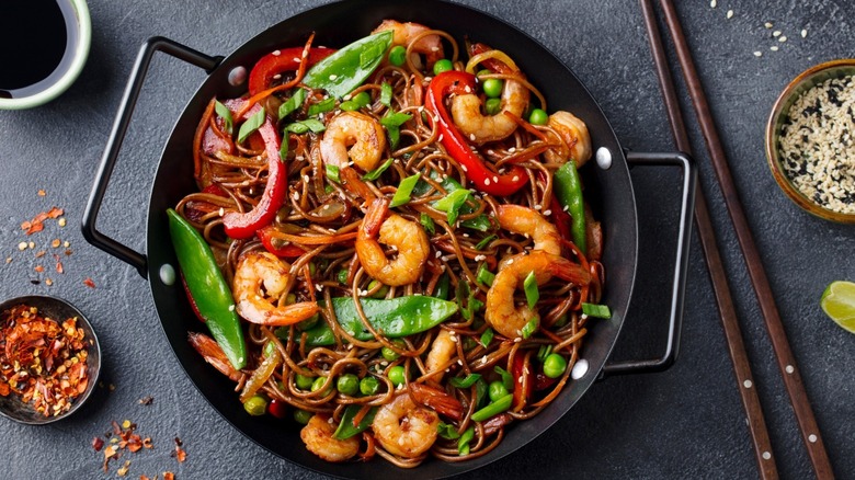 Shrimp stir-fry in wok