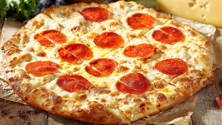 pepperoni pizza on a wooden table
