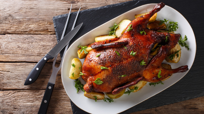Roast duck on a table