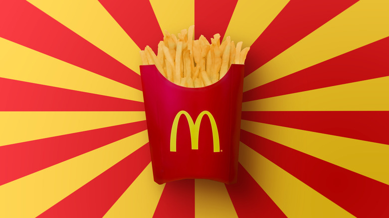 McDonald's fries carton on red and yellow background