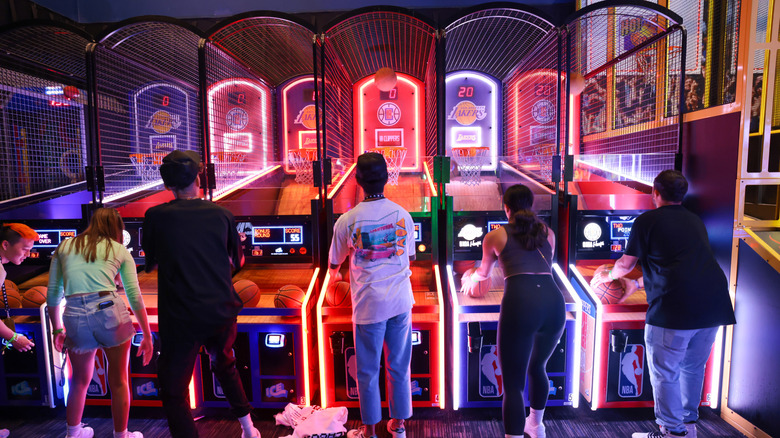 people playing Dave & Buster's games