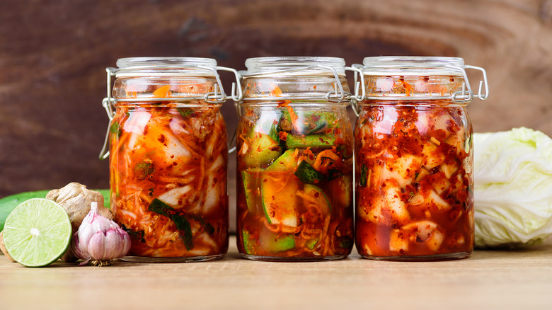 Three jars of homemade kimchi
