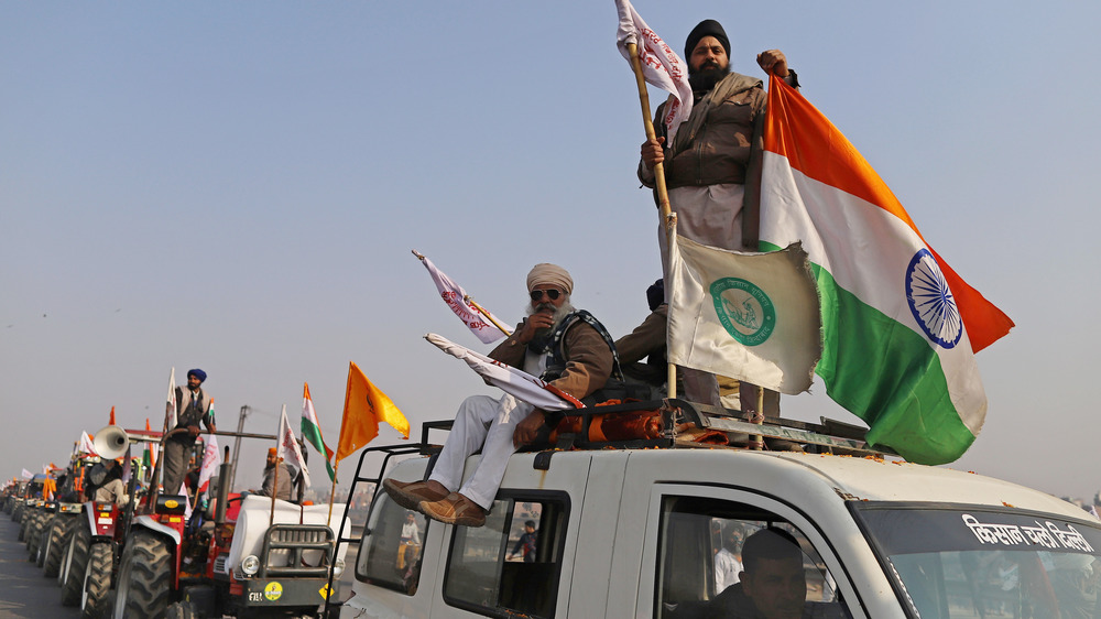 Indian farmers protest on tractors