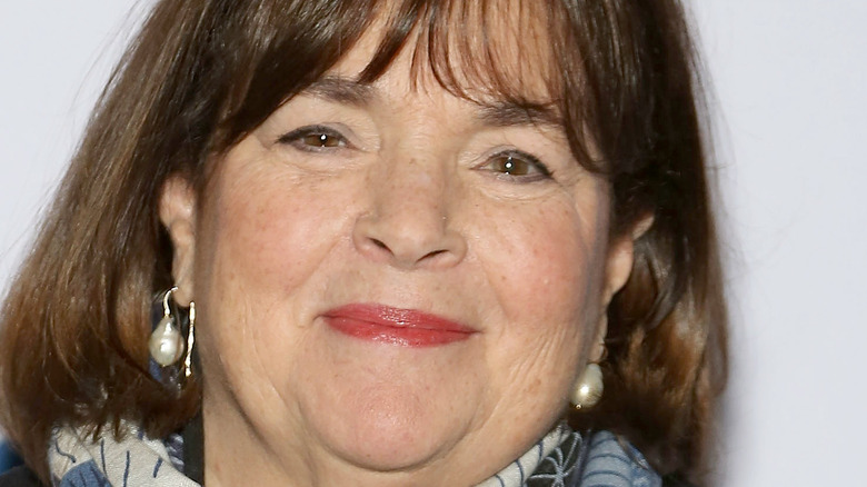 Ina Garten smiles with red lipstick