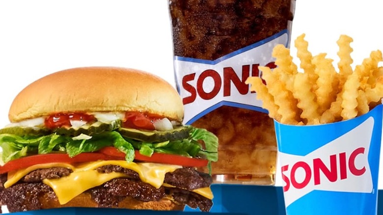 All-American Smasher burger with a soft drink and fries from Sonic