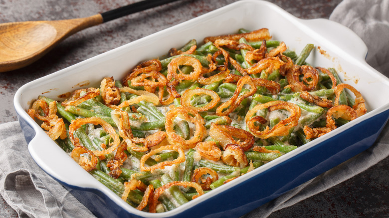 Green bean casserole topped with onions