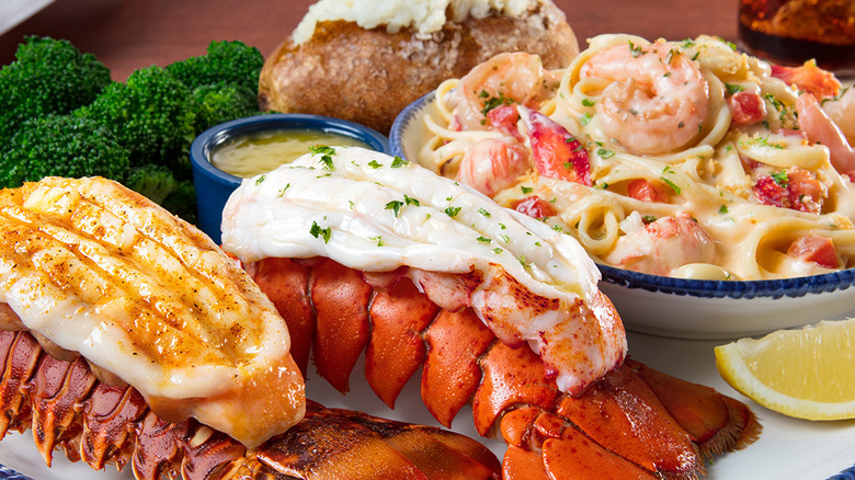 Lobster tails, shrimp pasta, broccoli, and a baked potato at Red Lobster