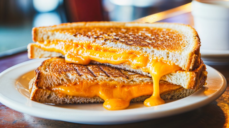 A cheesy grilled cheese sandwich in a restaurant