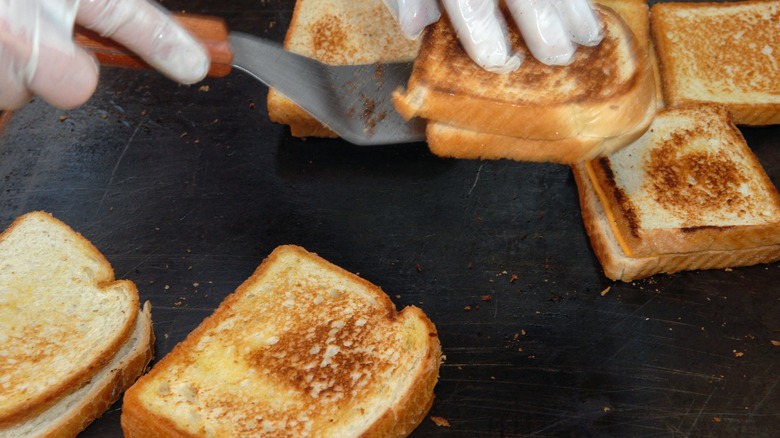 Grilled cheese sandwiches on a grill
