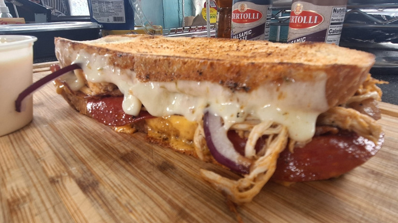 grilled cheese sandwich on wooden board