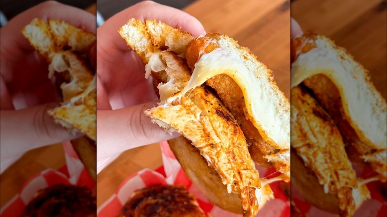 hand holding grilled cheese