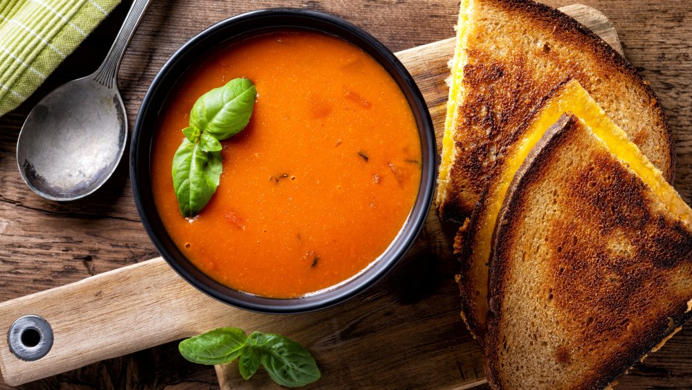 Bowl of tomato soup and grilled cheese