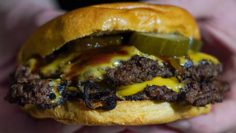 a close-up of a smash burger