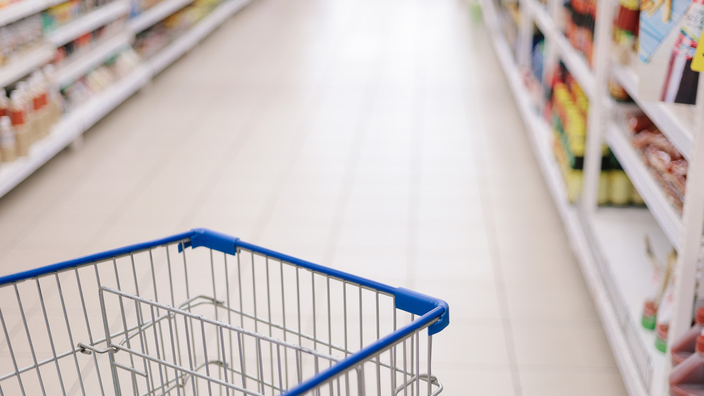 grocery store shelves and cart