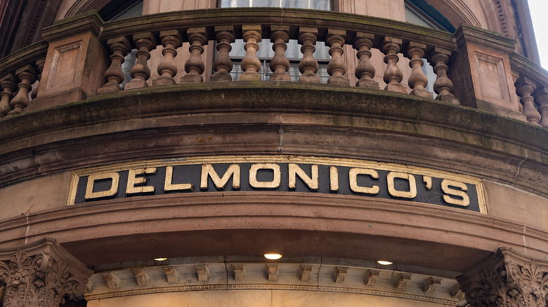 The Delmonico's sign at the front entrance of the restaurant