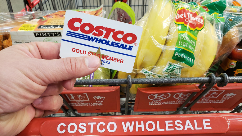 hand holding a Costco card