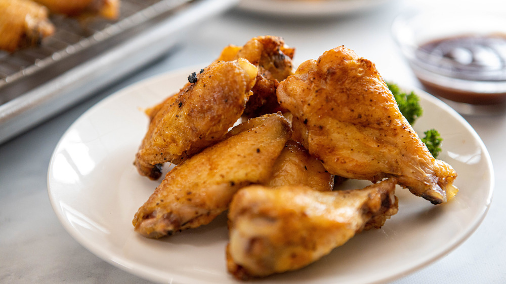 baked chicken wings on display