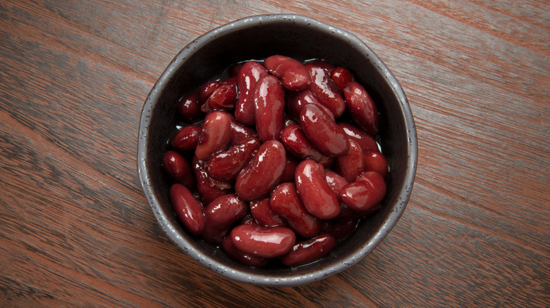 Canned red kidney beans on wodden table