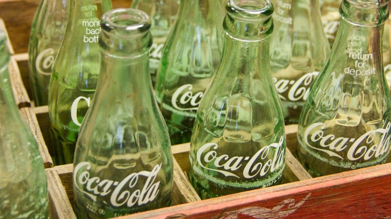 A case of antique Coke bottles