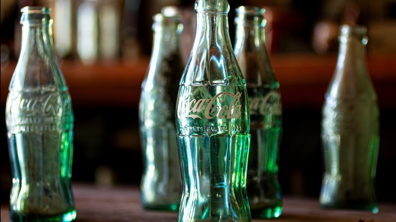 Green glass Coke bottles