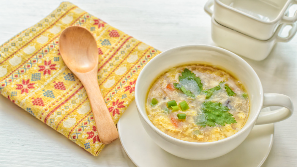 Egg drop soup in a white bowl 