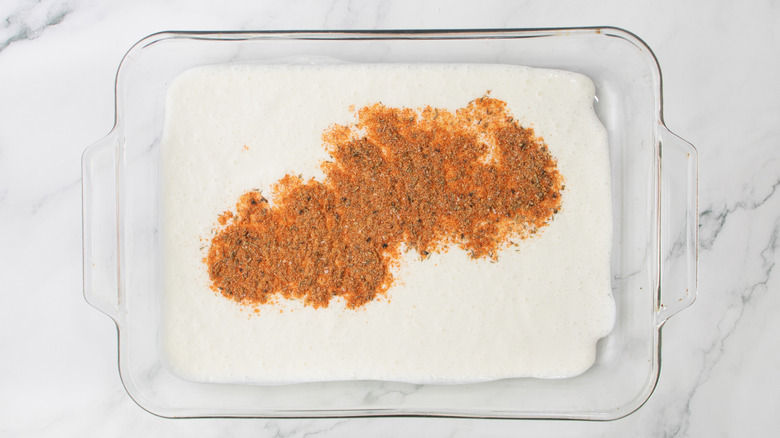 seasoning blend with buttermilk in casserole dish