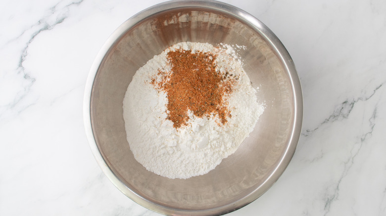 dry batter mix in bowl on marble surface