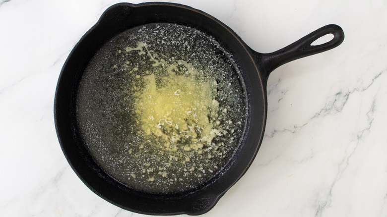 melted butter in skillet