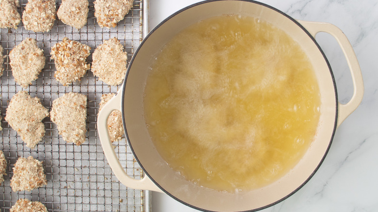 cooking oil with chicken nuggets