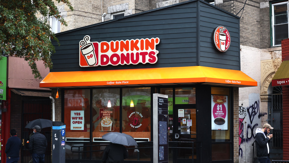 Dunkin' Donuts storefront in rain