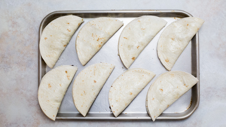 folded tacos on sheet pan