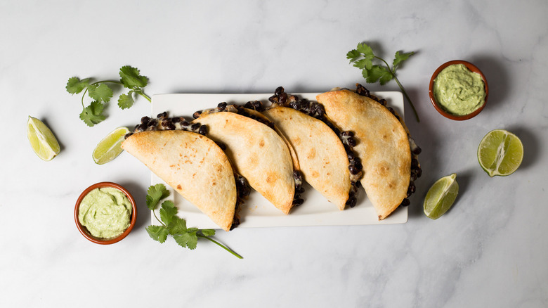 crispy tacos served on table