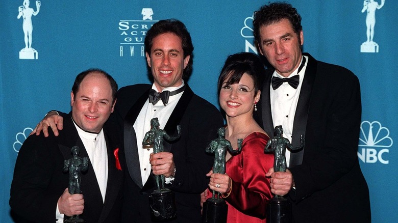 The cast of Seinfeld holding SAG Awards statues