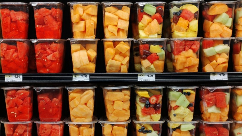 plastic boxes of fruit at supermarket 