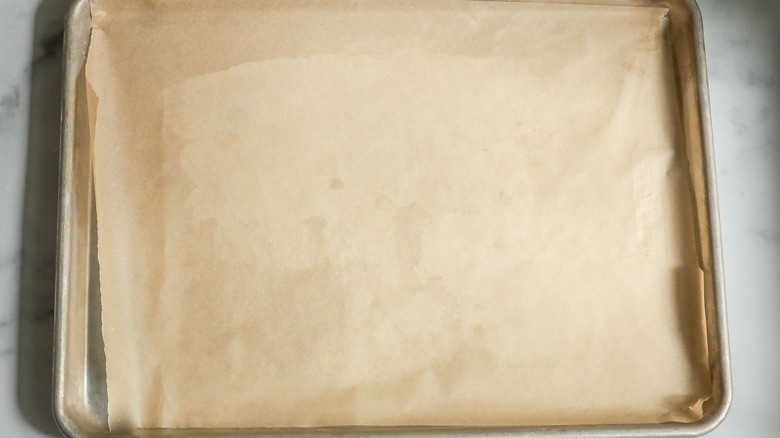 Baking sheet lined with parchment paper