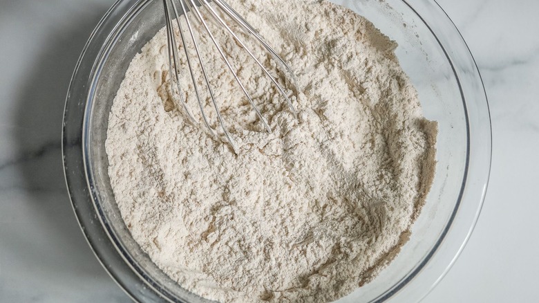 Flour mixture with whisk in bowl