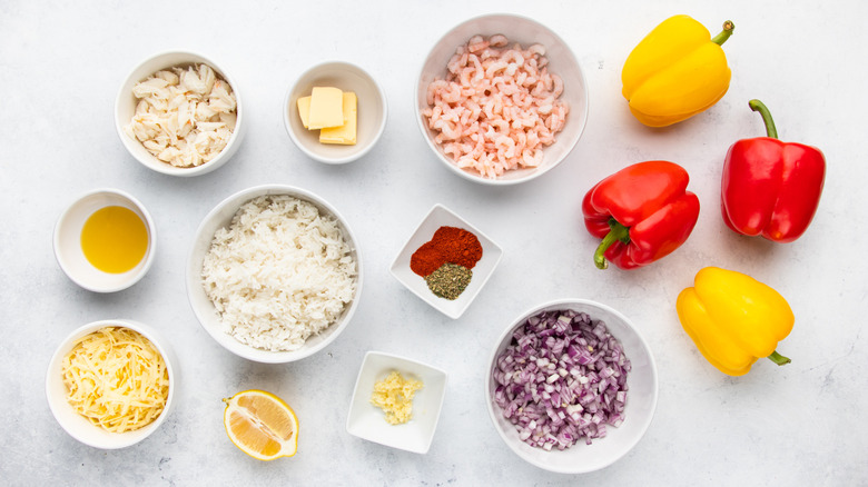 Seafood stuffed bell peppers ingredients laid out