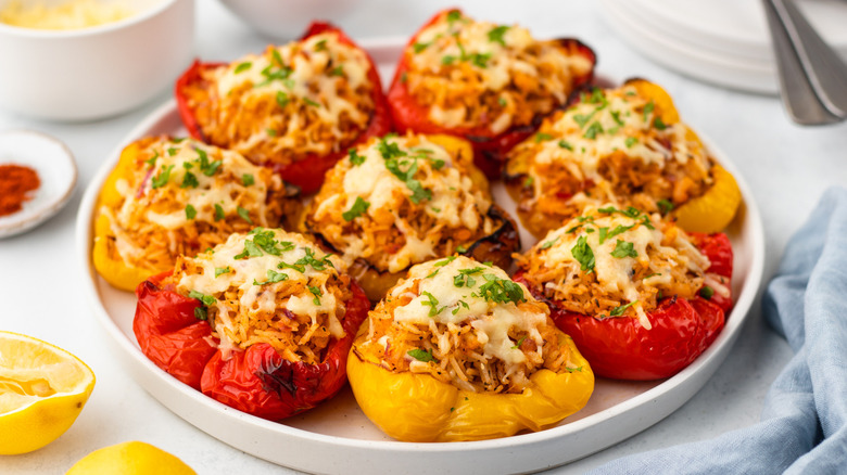 Cheesy stuffed bell peppers on plate