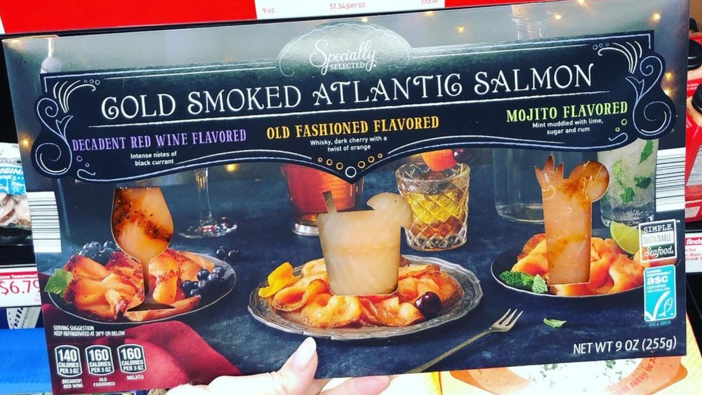 Hand holding Aldi smoked salmon