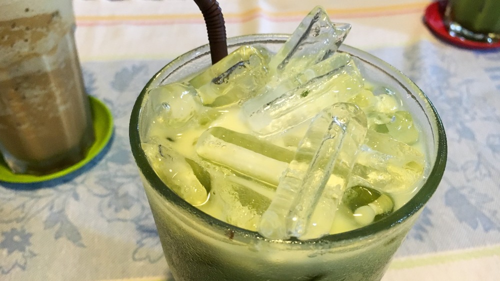 Green latte in a coffee shop