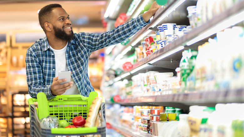 Man grocery shopping