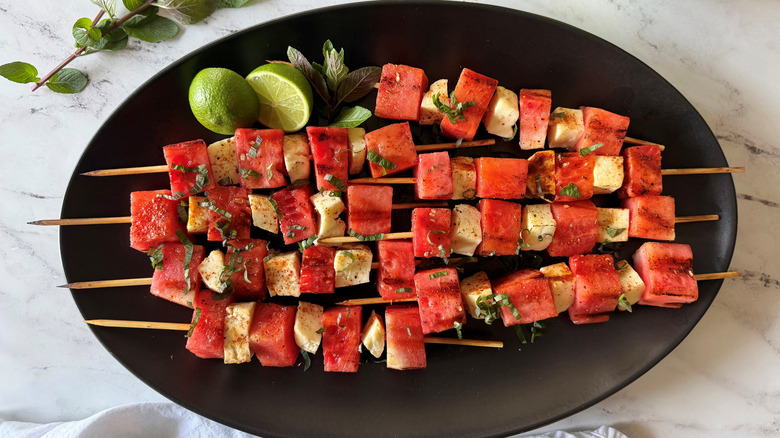 Halloumi and watermelon skewers on plate